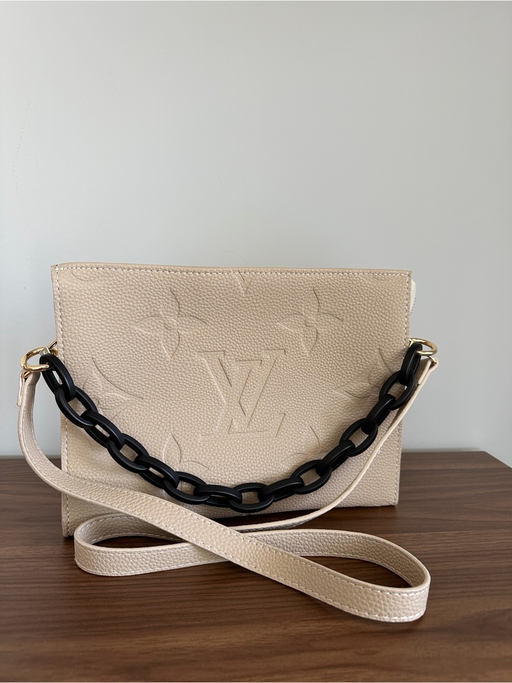 Beige Crossbody Bag with Black Chain Accent